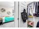 Walk-in closet with closet system for maximal organized storage at 2926 W Thorn Tree Dr, Phoenix, AZ 85085