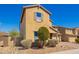 Spacious two-story home featuring low-maintenance desert landscaping, a paver driveway, and block wall at 2926 W Thorn Tree Dr, Phoenix, AZ 85085