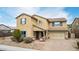 Charming two-story home boasting a tidy front yard, desert landscaping, and an attached two-car garage at 2926 W Thorn Tree Dr, Phoenix, AZ 85085