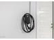 Garage featuring a wall mounted EV charger for electric vehicles at 2926 W Thorn Tree Dr, Phoenix, AZ 85085