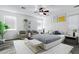 Stylish staged bedroom with modern furniture and decor accents at 29374 N 125Th Dr, Peoria, AZ 85383