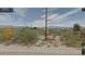 Street view of property in Winkelman, Arizona showing desert foliage and a 'cattle guard' sign at 3200 S Mesa Rd, Winkelman, AZ 85192