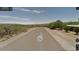 A street view of the property on a sunny day in Winkelman, AZ at 3200 S Mesa Rd, Winkelman, AZ 85192