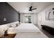 Bright bedroom with a king bed, patio access, and modern decor at 3401 N 37Th St # 12, Phoenix, AZ 85018