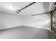 Spacious and well-lit garage with a clean floor, ideal for parking and additional storage at 3401 N 37Th St # 12, Phoenix, AZ 85018