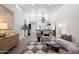 Open-concept living room leading into a modern kitchen and dining area with stylish decor at 3401 N 37Th St # 12, Phoenix, AZ 85018