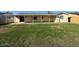 Large, well-maintained backyard with green grass perfect for outdoor activities and entertainment at 3515 E Winchcomb Dr, Phoenix, AZ 85032