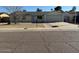 Charming single-story home featuring a well-maintained front yard and a two-car garage at 3515 E Winchcomb Dr, Phoenix, AZ 85032