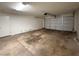 Spacious garage with an automatic door and ample room for parking and storage at 3515 E Winchcomb Dr, Phoenix, AZ 85032