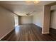 Open living area with wood floors leads to outdoor living space at 3515 E Winchcomb Dr, Phoenix, AZ 85032