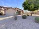Charming single-story home featuring desert landscaping with a two-car garage and neutral paint at 3527 N Kashmir --, Mesa, AZ 85215