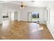 Spacious living room with wood floors, recessed lighting, ceiling fan, and access to the backyard at 3527 N Kashmir --, Mesa, AZ 85215