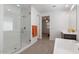 Well-lit bathroom with a glass enclosed shower and modern fixtures at 37051 N Rhinelander Dr, San Tan Valley, AZ 85140