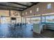 Spacious community room with fireplace, dining area, and kitchenette at 37051 N Rhinelander Dr, San Tan Valley, AZ 85140