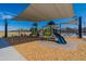 Playground with shade coverings and multiple pieces of play equipment at 37051 N Rhinelander Dr, San Tan Valley, AZ 85140