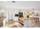 Bright kitchen features white cabinets, a butcher block island, stainless steel appliances, and tile floors at 3723 S Kenneth Pl, Tempe, AZ 85282