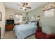 Bedroom with ceiling fan and a calming aesthetic at 40802 W Portis Dr, Maricopa, AZ 85138