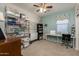 This versatile bedroom features ample storage and a sewing station at 40802 W Portis Dr, Maricopa, AZ 85138