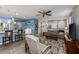Spacious living area with an open floor plan, neutral tones, and comfortable seating at 40802 W Portis Dr, Maricopa, AZ 85138