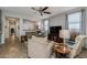 Relaxing living room with an open design, featuring stylish decor and lots of natural light at 40802 W Portis Dr, Maricopa, AZ 85138