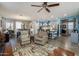 Inviting living space with an open layout, connecting the kitchen, dining, and living areas at 40802 W Portis Dr, Maricopa, AZ 85138