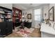 Home office with a desk and a comfortable chair at 40802 W Portis Dr, Maricopa, AZ 85138