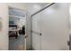 Shower with glass doors adjacent to bedroom space at 40802 W Portis Dr, Maricopa, AZ 85138