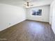 Spacious bedroom with neutral paint, ceiling fan, and ample light at 4119 N 78Th Ave, Phoenix, AZ 85033