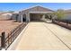 Inviting single-story home with a charming covered driveway and well-maintained front yard at 4119 N 78Th Ave, Phoenix, AZ 85033