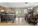 Spacious dining area with backyard access flowing into a modern kitchen at 419 N Valencia Dr, Chandler, AZ 85226