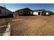 Exterior view of multiple homes under construction in a developing community at 4296 E Brook Lynn Pl, San Tan Valley, AZ 85140