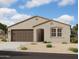 Charming single-story home with desert landscaping, covered entry, and a two-car garage at 4296 E Brook Lynn Pl, San Tan Valley, AZ 85140