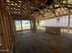 Interior view of a home under construction, framing with a sliding glass door to the backyard at 4296 E Brook Lynn Pl, San Tan Valley, AZ 85140