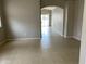 Open living space with tile flooring and an arched doorway leading to other areas of the home at 4402 E Creosote Dr, Cave Creek, AZ 85331