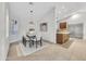 Dining area with table set, modern pendant light, and easy access to the kitchen, creating an inviting space at 446 W Sereno Dr, Gilbert, AZ 85233
