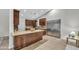 Kitchen featuring granite countertops, stainless steel appliances, and ample dark wood cabinetry at 446 W Sereno Dr, Gilbert, AZ 85233