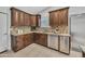 Bright kitchen featuring granite countertops, stainless steel appliances, tile backsplash, and lots of cabinet space at 446 W Sereno Dr, Gilbert, AZ 85233