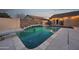 Beautiful backyard pool with waterfall feature, basketball hoop and stunning views at 446 W Sereno Dr, Gilbert, AZ 85233