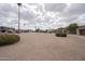 Spacious parking area surrounded by well-maintained residential buildings and desert landscaping at 4719 E Belleview St, Phoenix, AZ 85008