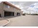 This is the exterior of a multi-unit building with carports and an expansive parking lot at 4719 E Belleview St, Phoenix, AZ 85008