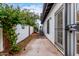 Fenced backyard with low-maintenance landscape and secure gate, ensuring privacy at 501 E 2Nd Ave # 14, Mesa, AZ 85204
