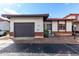 Charming single-story home featuring a private garage and a welcoming front entrance at 501 E 2Nd Ave # 14, Mesa, AZ 85204