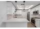 Bright and open kitchen with quartz countertops and stainless appliances at 501 E 2Nd Ave # 14, Mesa, AZ 85204