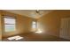 Bright bedroom with neutral walls and carpet flooring and multiple windows at 6005 E Selkirk Cir, Mesa, AZ 85215