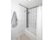 Bathroom featuring a shower-tub combination with white and gray tiling at 6323 E Nisbet Rd, Scottsdale, AZ 85254