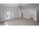 Spacious bedroom featuring a ceiling fan and sliding glass doors to the patio at 6323 E Nisbet Rd, Scottsdale, AZ 85254