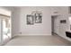 Bright dining area with neutral tones, tile floors, and modern lighting fixture at 6323 E Nisbet Rd, Scottsdale, AZ 85254