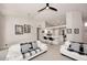 Open living room featuring high ceilings, tile floors, and view into the kitchen at 6323 E Nisbet Rd, Scottsdale, AZ 85254