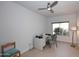 Office space with a desk area, neutral color scheme, and tile floors at 6323 E Nisbet Rd, Scottsdale, AZ 85254
