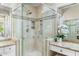 An updated shower space includes multiple shower heads, and a built-in shampoo nook at 6340 E Marioca Cir, Scottsdale, AZ 85266